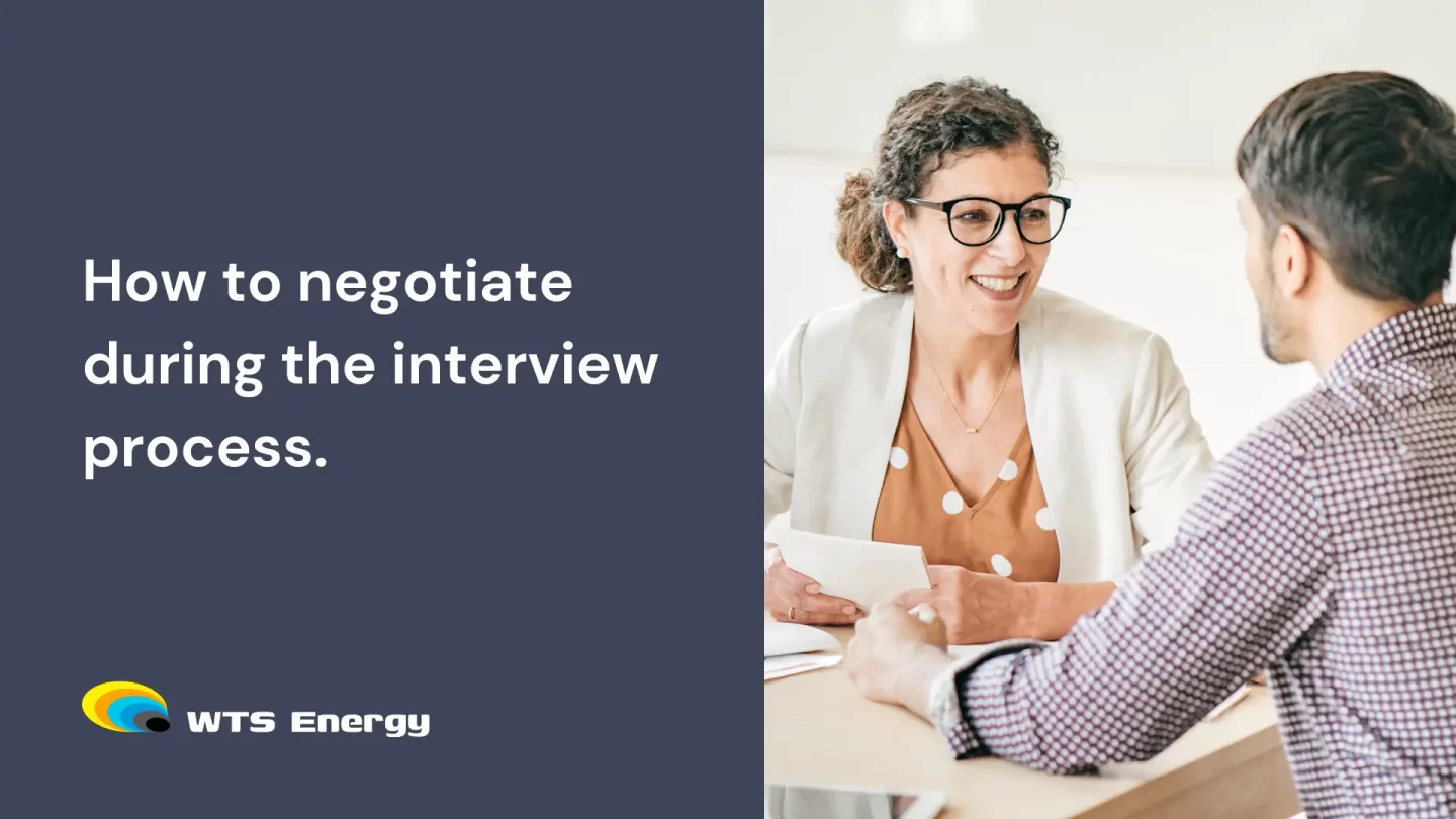 how to negotiate during the interview process. woman is interviewing young adult with a smile